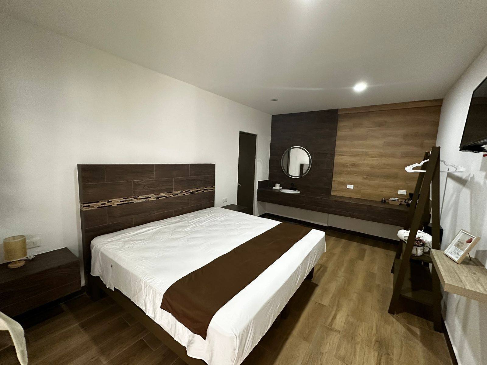 White Sand Playa: Classic room with a large bed and wood-look floor